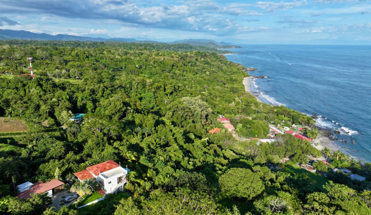 Aerial view of rainforest meeting the Pacific coast of Costa Rica